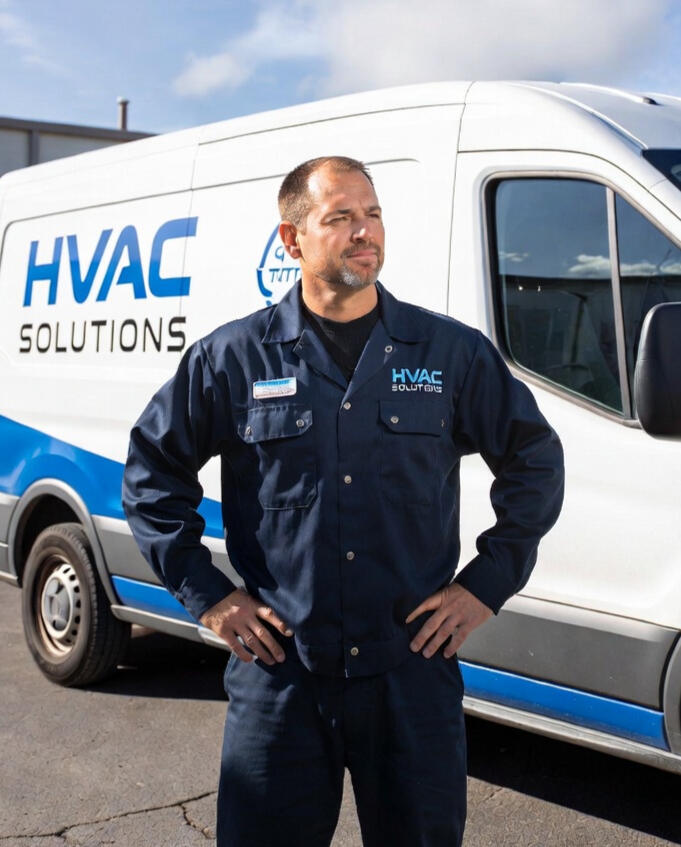 Proud HVAC Owner with utility van HVAC Technician